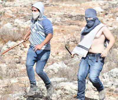 057_settlers-brutally-attacked-palestinian-farmers2.jpg