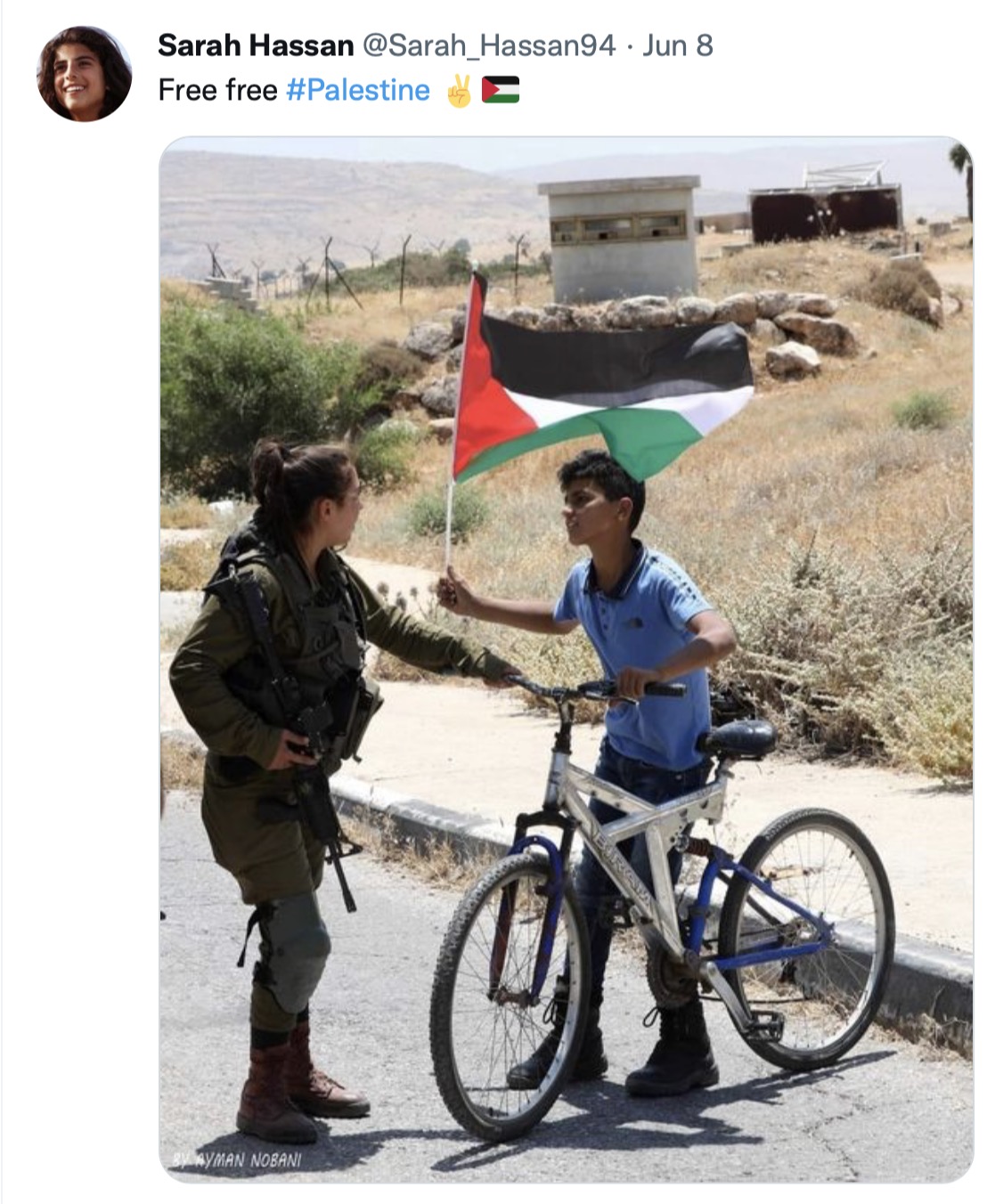 Palestine-flag-boy-on-bike-is-stopp